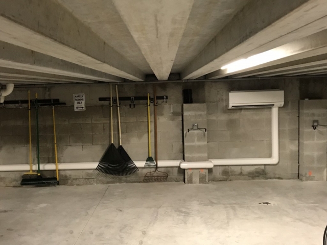 Garage mini-split air conditioner installation.