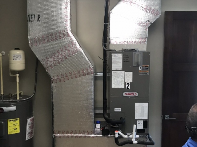 Custom garage air conditioner installation.