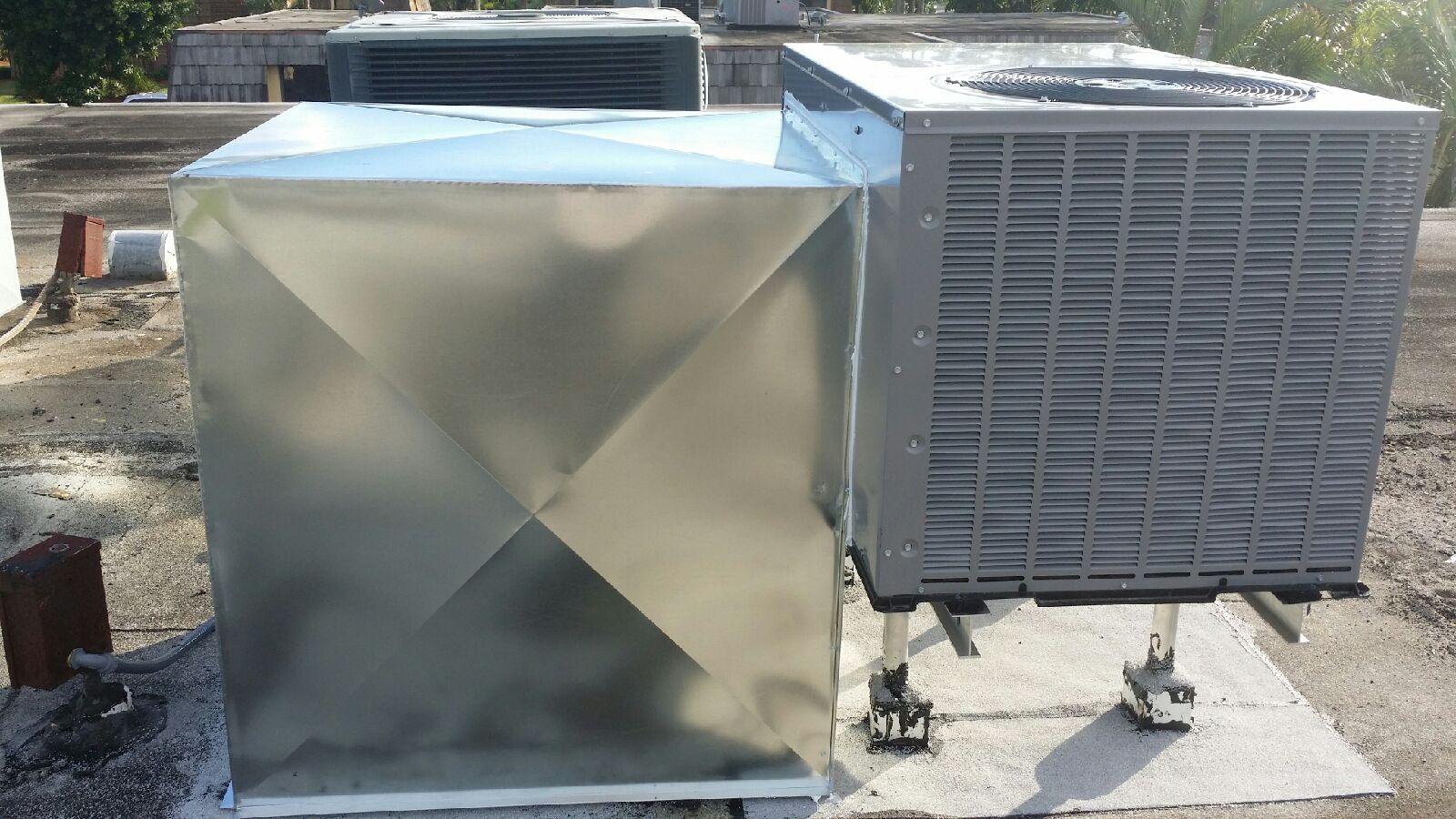 Commercial roof top air conditioner installation.