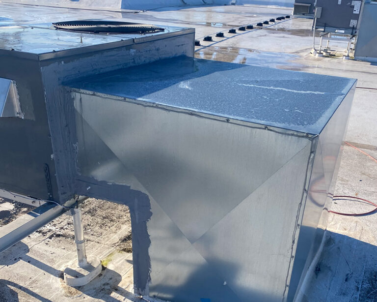 commercial air conditioning ductwork after replacement on roof